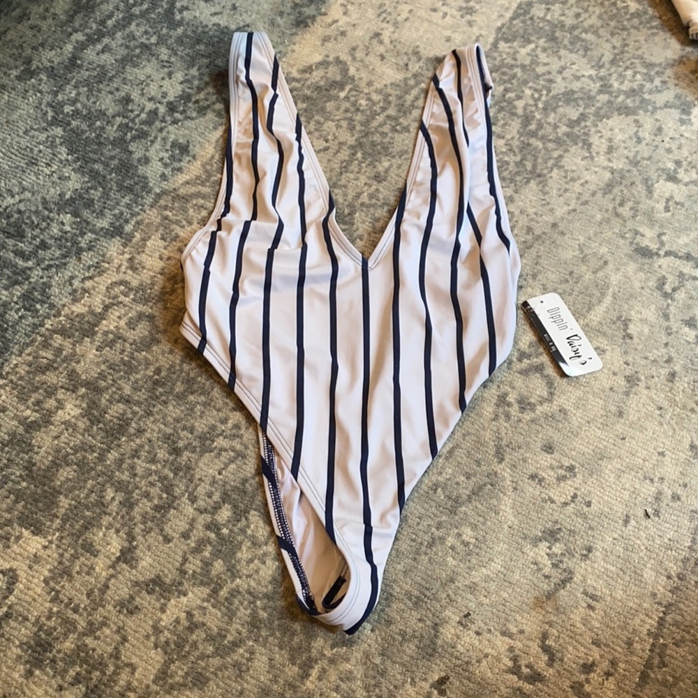 Dippin’ Daisy’s Blue and white stripped one piece